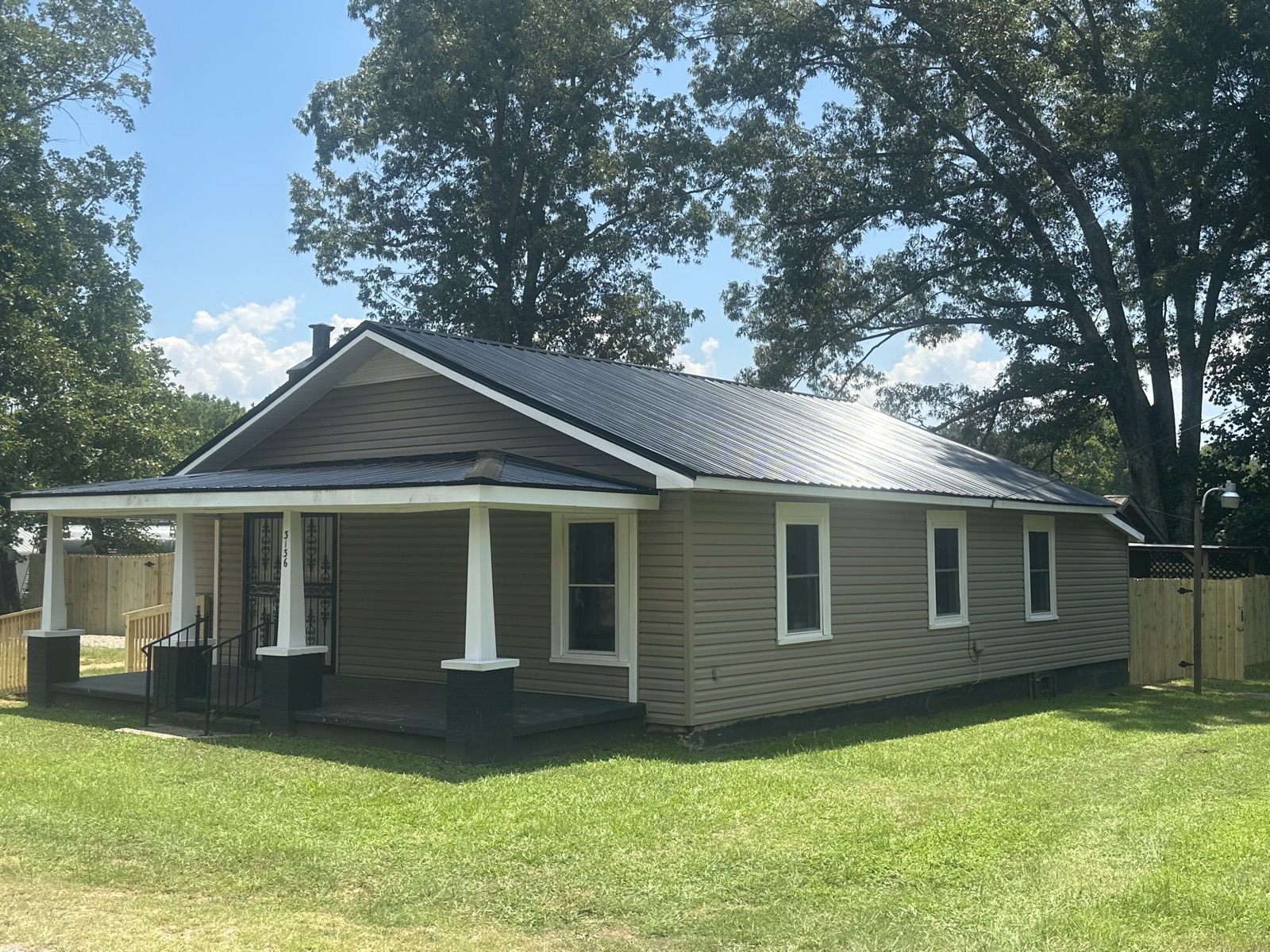 Roof, siding & porch renovation